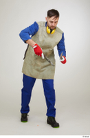  Photos Raul Conley standing whole body working with hammer and pliers 0001.jpg